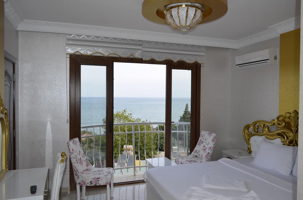 Alev Palace Otel Arsuz Habitación foto