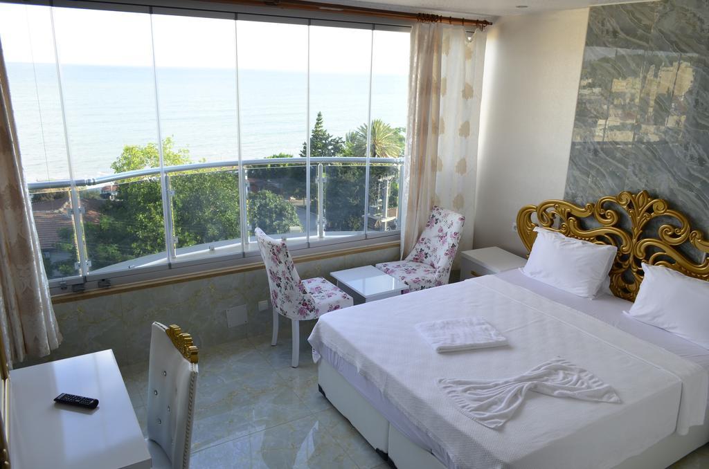 Alev Palace Otel Arsuz Habitación foto
